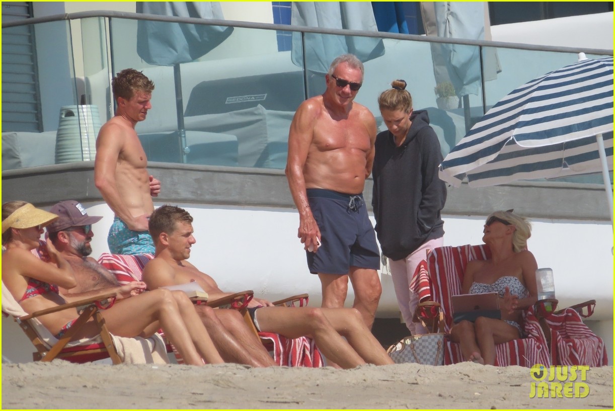 joe montana shirtless at the beach with his kids 414489464
