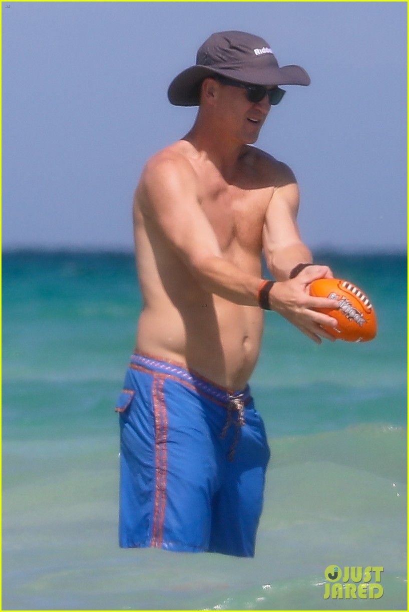 peyton manning shirtless at the beach 114492986