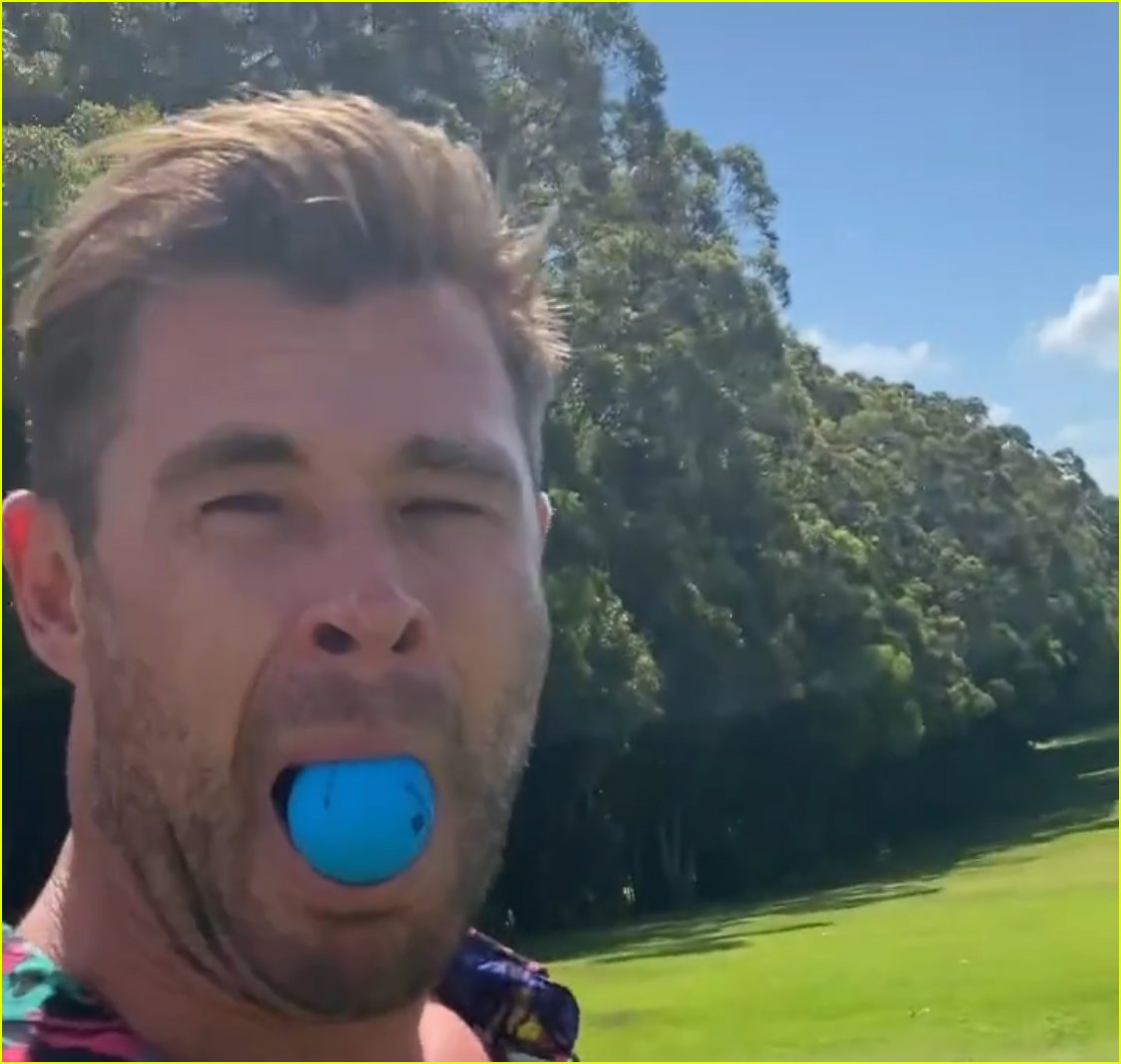 chris hemsworth jokes around while golfing with his son brother liam 054500785