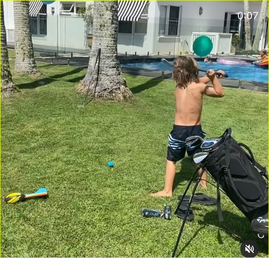 chris hemsworth jokes around while golfing with his son brother liam 094500789