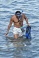 sydney sweeney rocks red bikini while snorkeling in hawaii 18