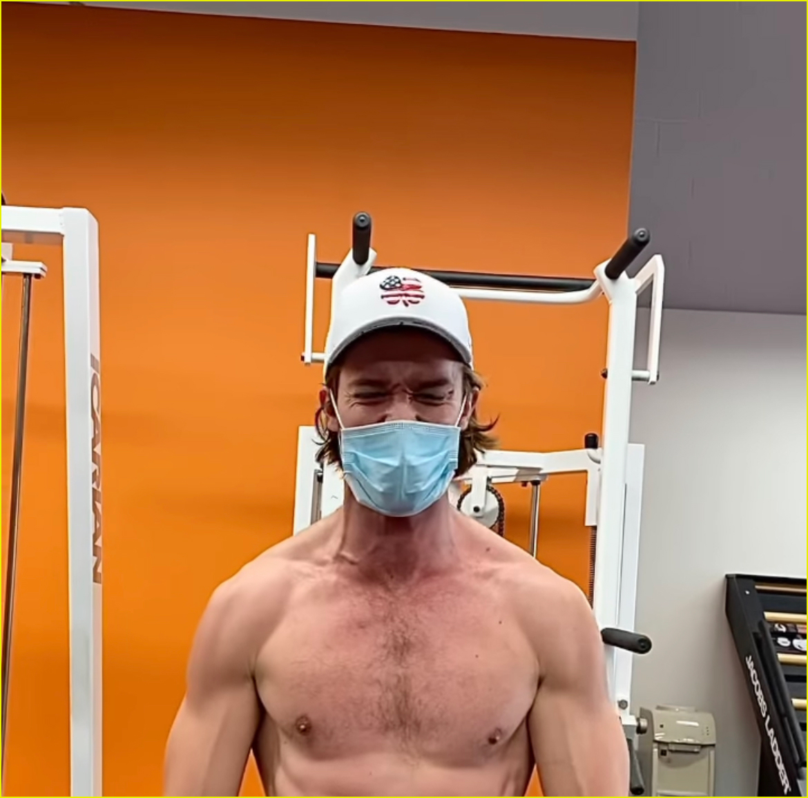 patrick schwarzenegger bares abs wears mask during workout 01