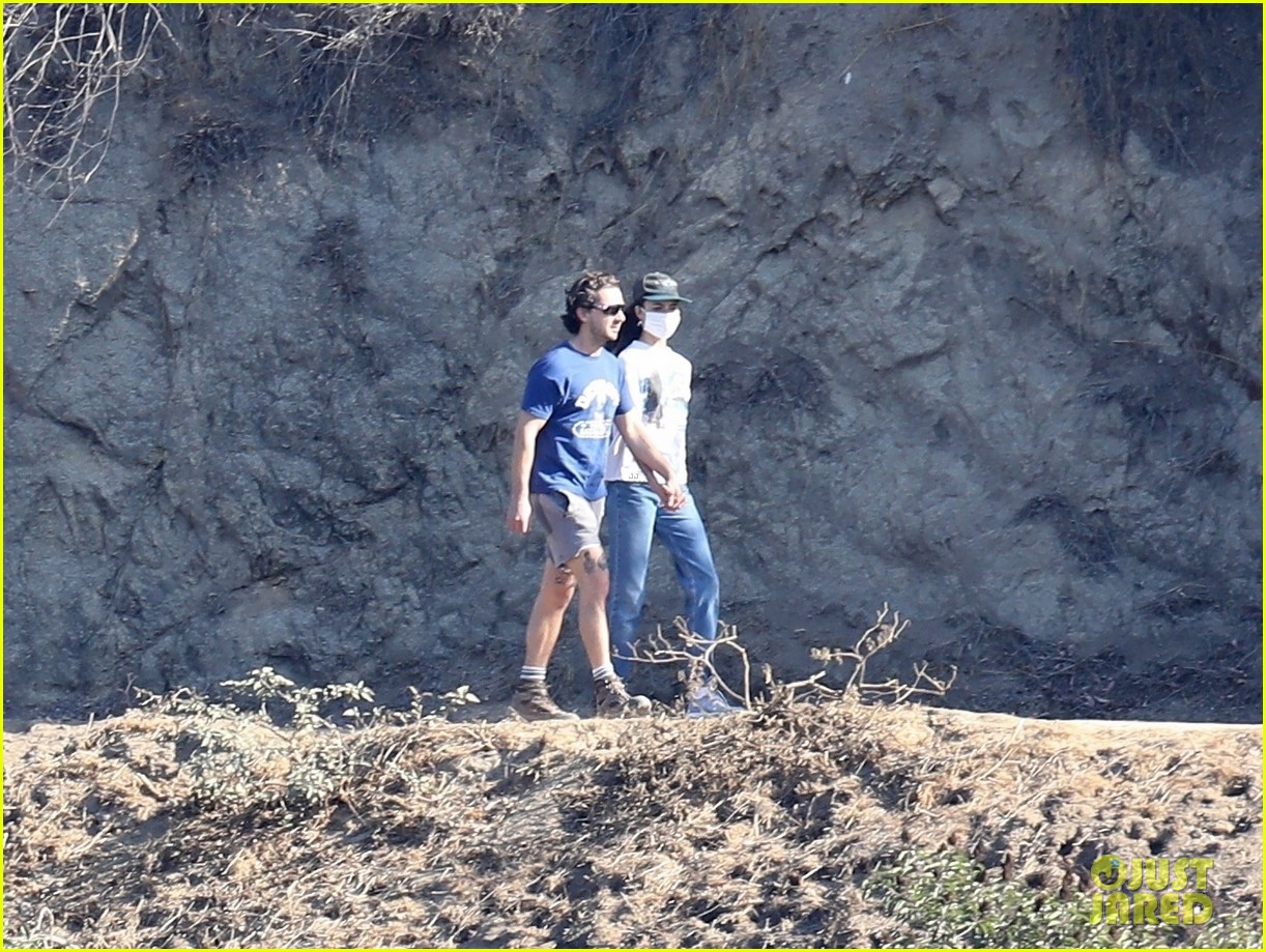 shia labeouf margaret qualley hold hands on hike 42