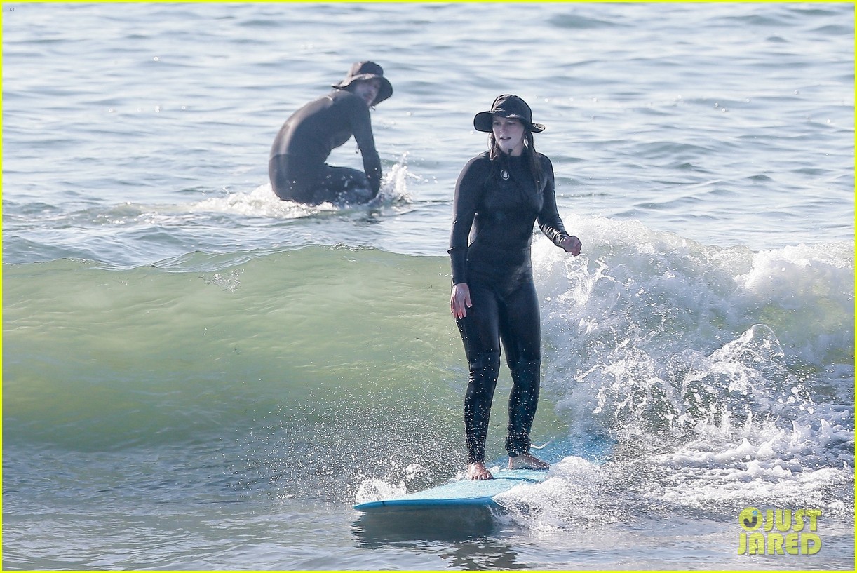 adam brody strips out of wetsuit surfing leighton meester 364520877