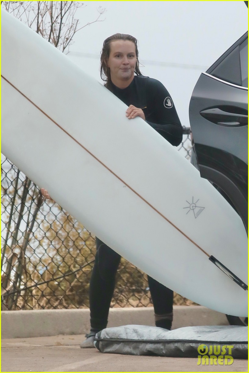 adam brody strips out of wetsuit surfing leighton meester 474520888