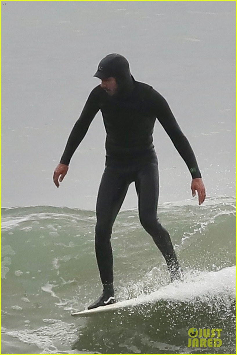 adam brody strips out of wetsuit surfing leighton meester 564520897