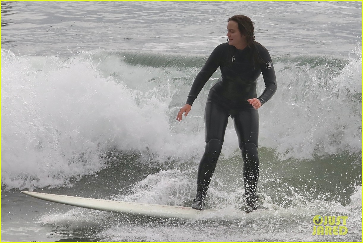 adam brody strips out of wetsuit surfing leighton meester 804520921