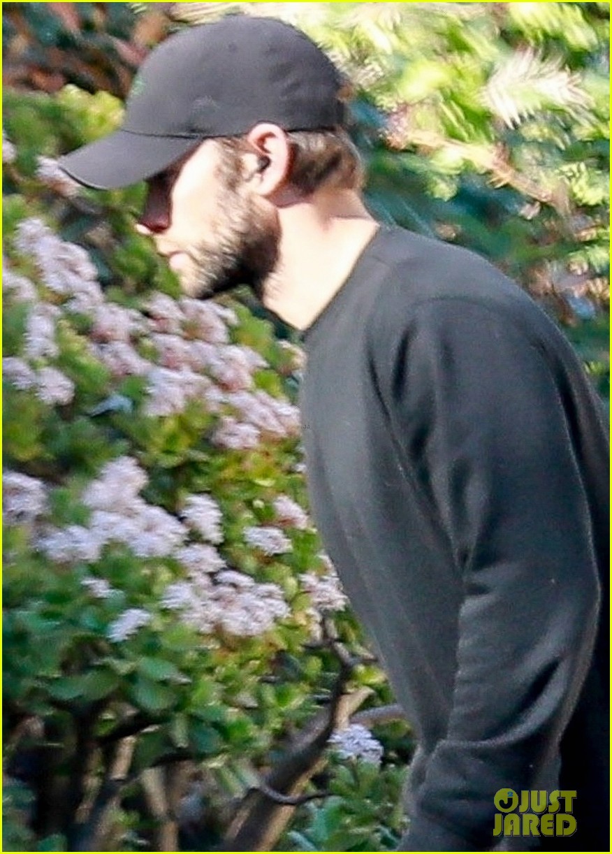 chace crawford wears all black while walking his dog 04