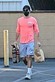 chace crawford bright colorful coral shirt grocery shopping 03