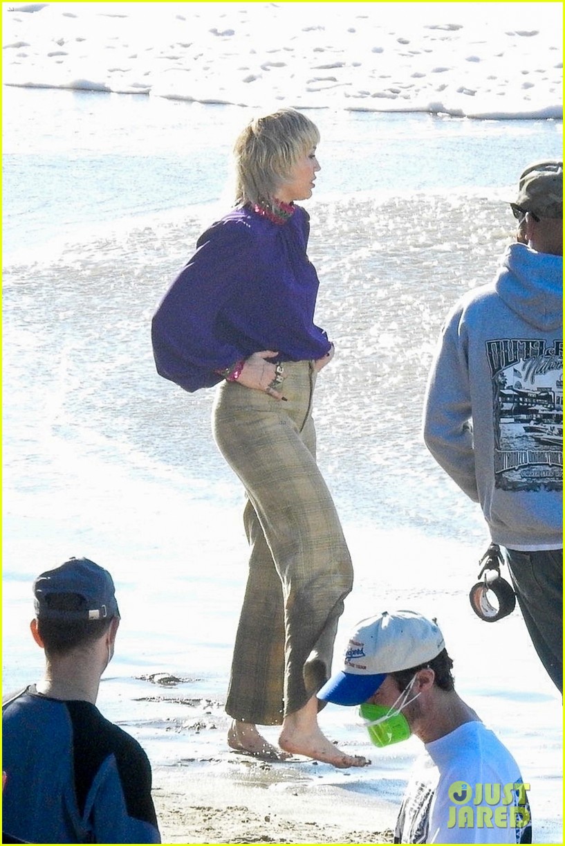 miley cyrus filming new music video at beach 18