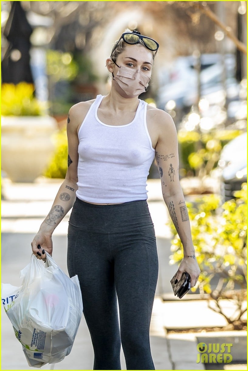 miley cyrus braless in see through tank top 064518910