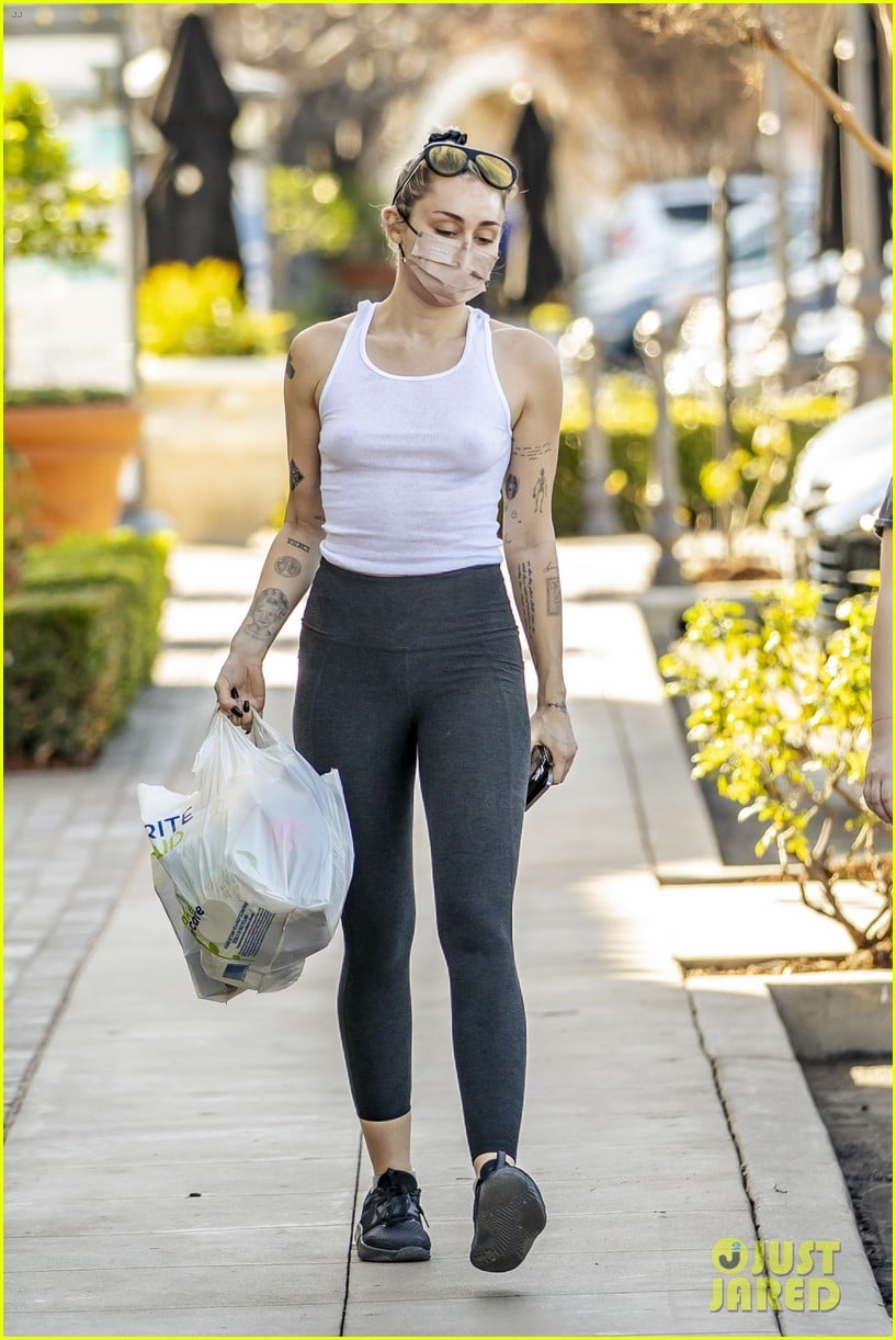Miley Cyrus Goes Braless in See-Through Tank Top While Running