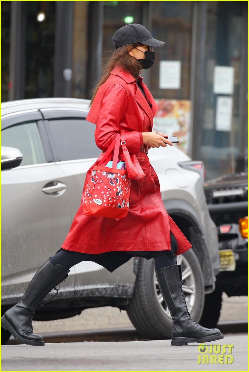 irina shayk carries minnie bag matching red look 03