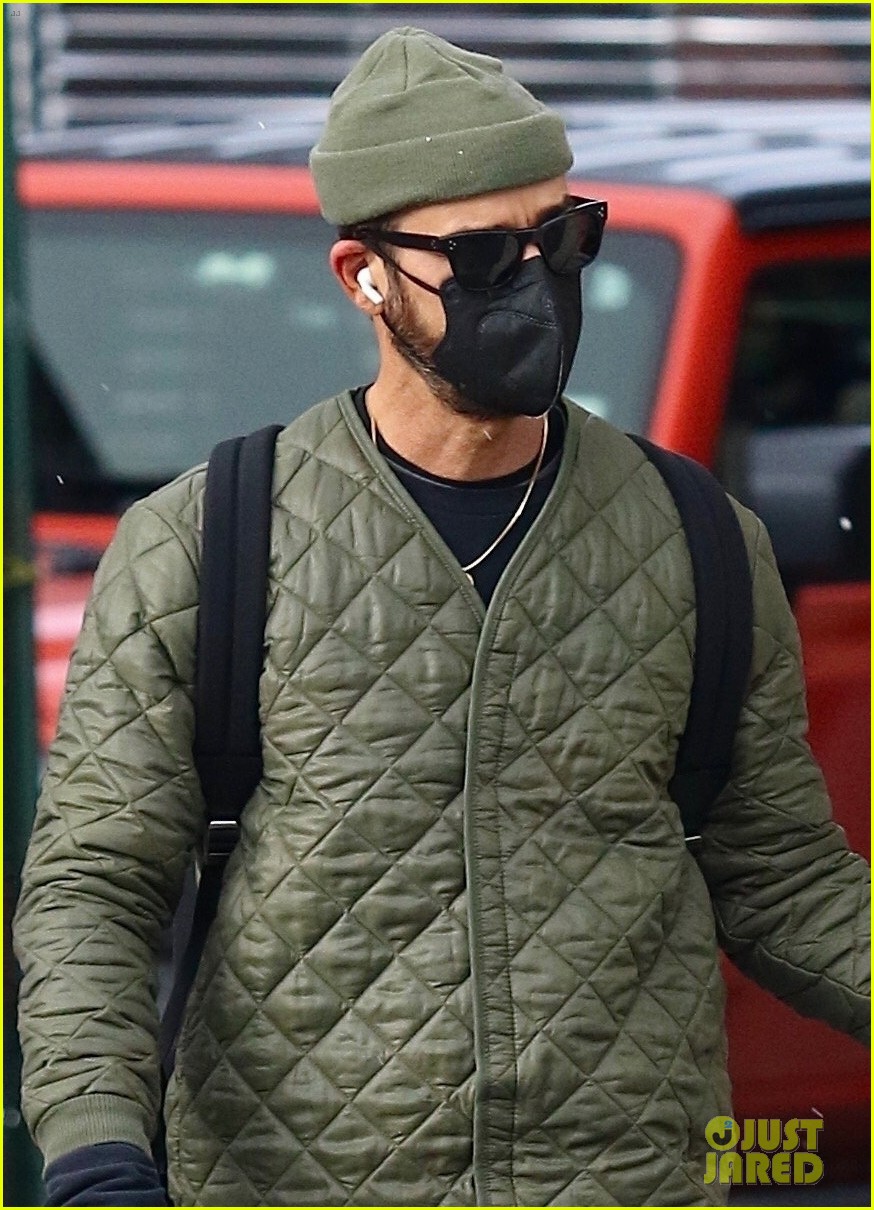 justin theroux stays warm while walking dog kuma in nyc 04