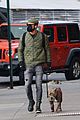 justin theroux stays warm while walking dog kuma in nyc 03