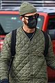 justin theroux stays warm while walking dog kuma in nyc 04