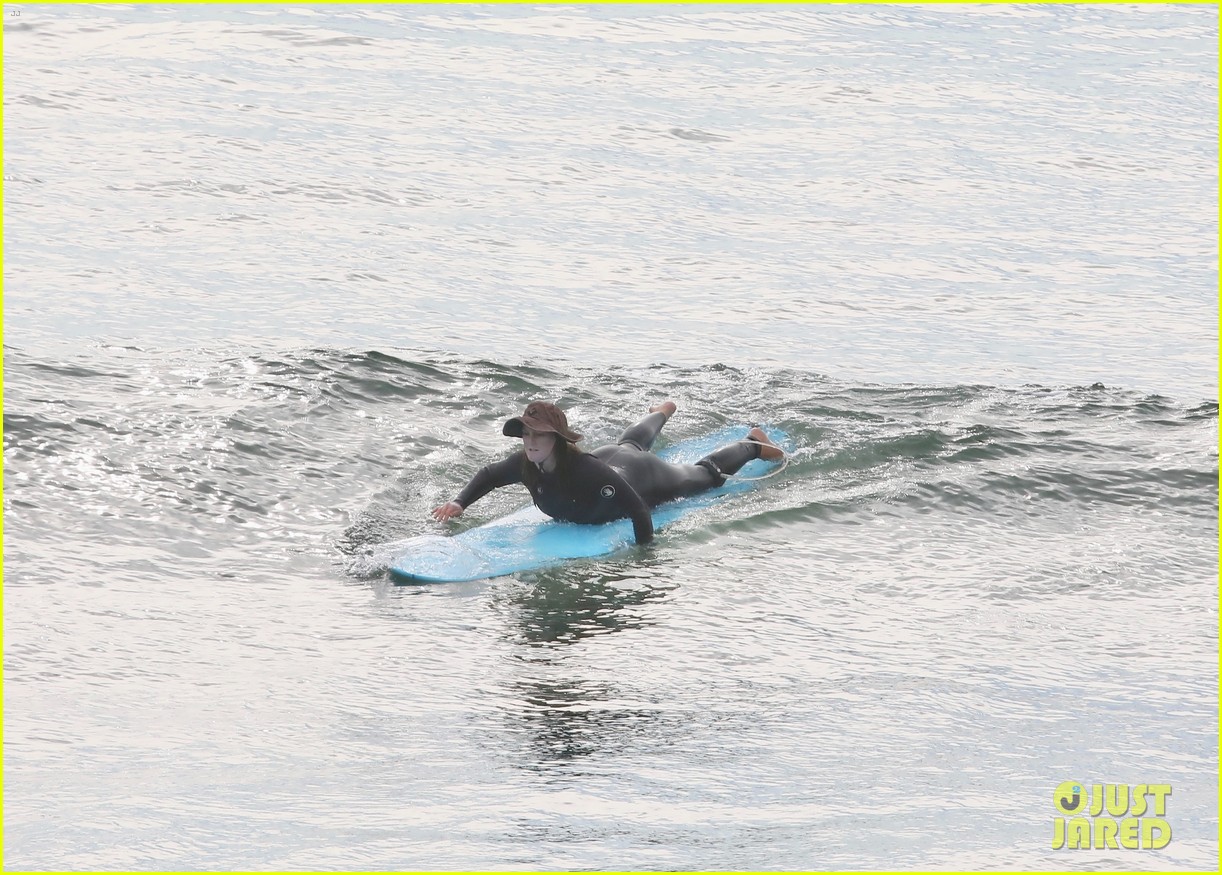 leighton meester adam brody surfing at the beach 354517027