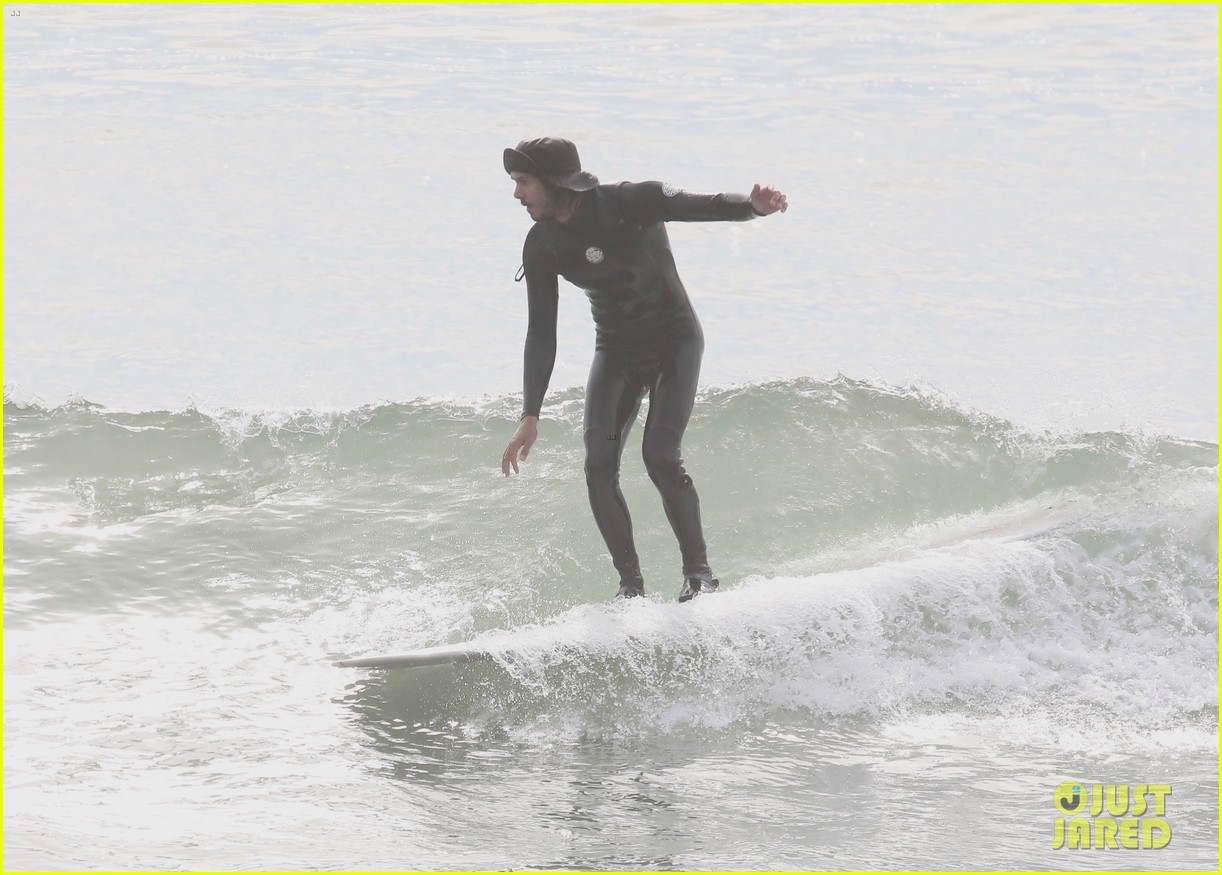 leighton meester adam brody surfing at the beach 624517054