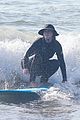 leighton meester adam brody hold hands surfing 34