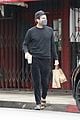 zachary quinto all black picking up lunch 03