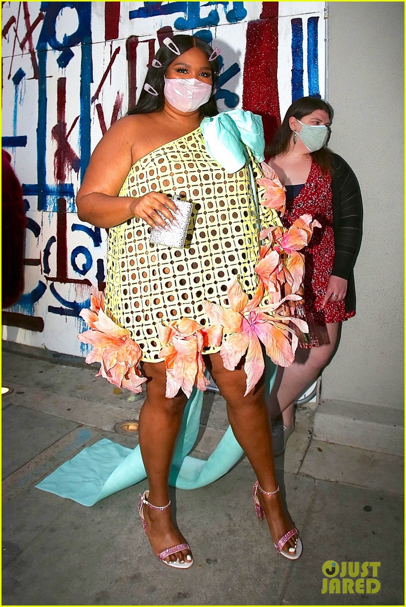 lizzo carries bedazzled flask to grammys after party 054533287