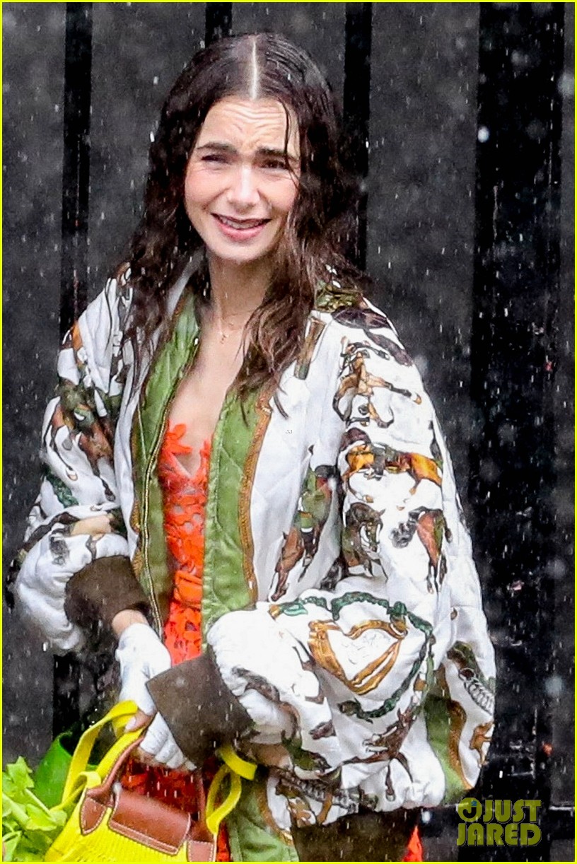 lily collins caught in rain with lucas bravo emily in paris 024557978