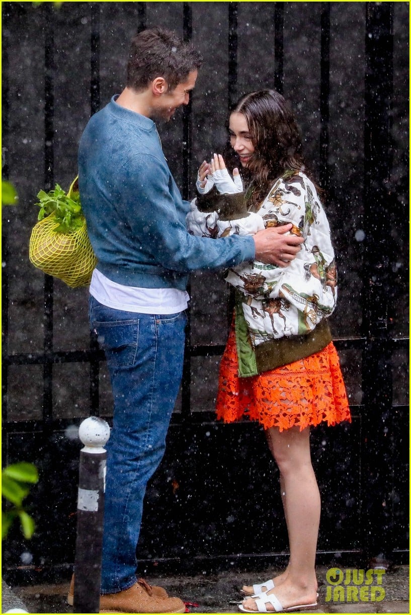 lily collins caught in rain with lucas bravo emily in paris 084557984