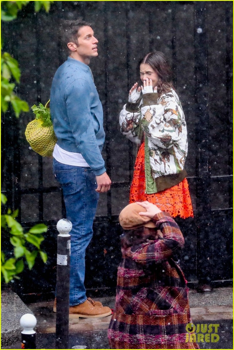 lily collins caught in rain with lucas bravo emily in paris 49