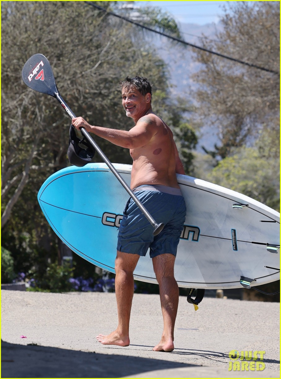 rob lowe shirtless paddleboarding ocean 024578778