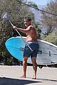 rob lowe shirtless paddleboarding ocean 02