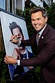 andrew rannells tuc watkins couple up for portrait of pride event 06