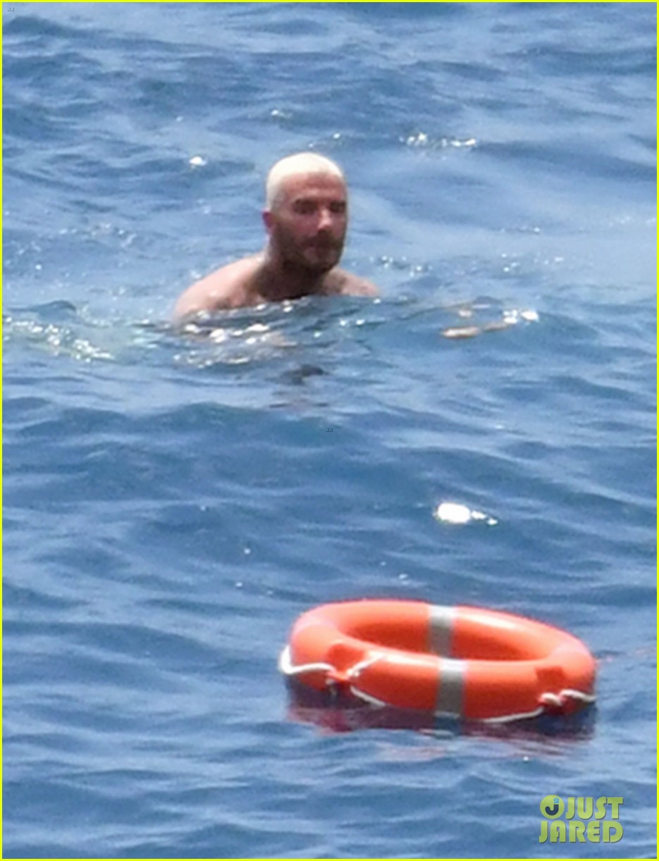 david beckham jumps off yacht with son cruz beckham 534594619