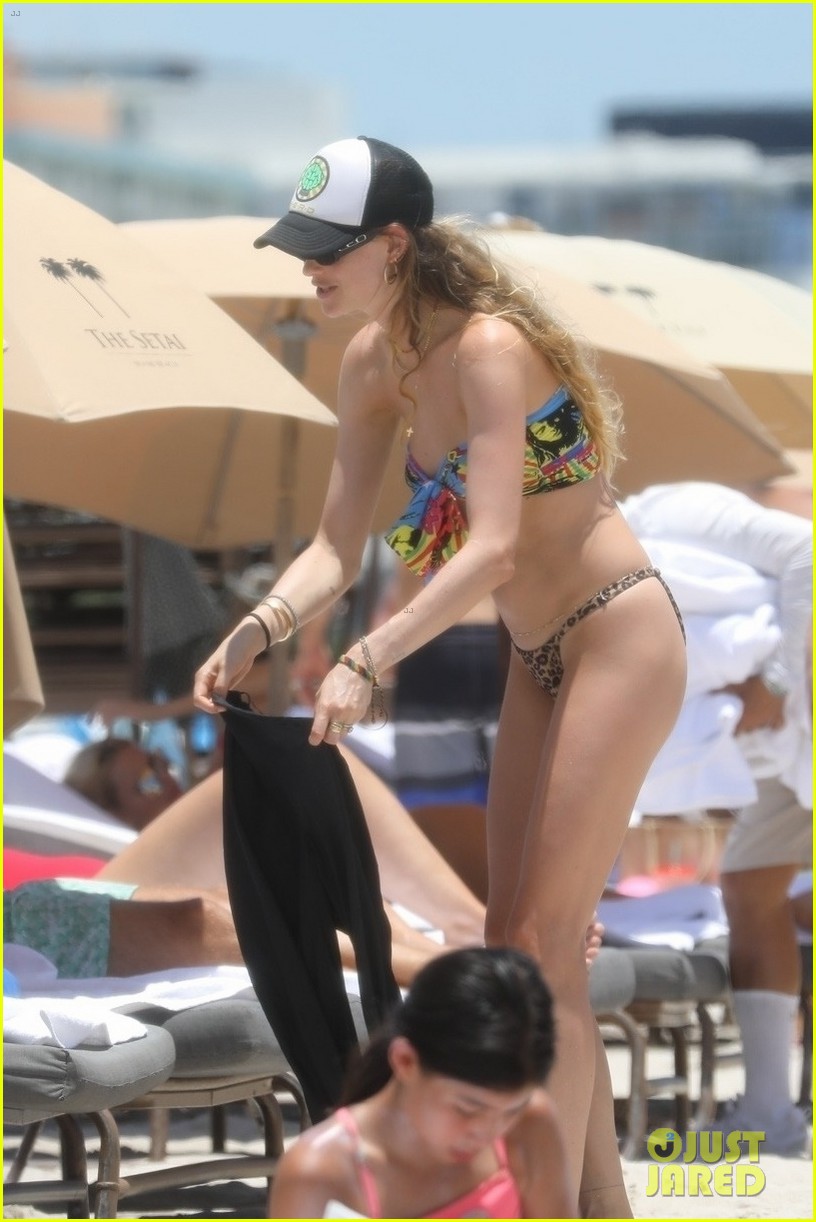 behati prinsloo at the beach while adam levine works out 184580918