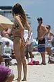 behati prinsloo at the beach while adam levine works out 22