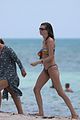 behati prinsloo at the beach while adam levine works out 27