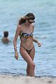 behati prinsloo at the beach while adam levine works out 35