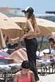 behati prinsloo at the beach while adam levine works out 41
