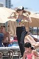 behati prinsloo at the beach while adam levine works out 42