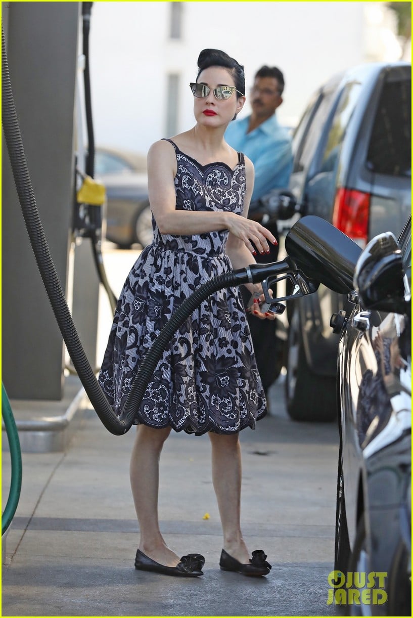 dita von teese gets all dolled up to pump gas 034580574