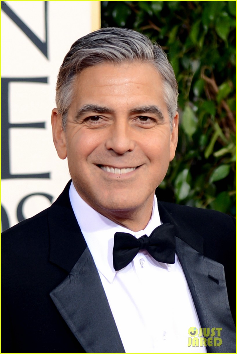 Clooney Helps Neighbors With Flood Clean Up In Lake Como Photo