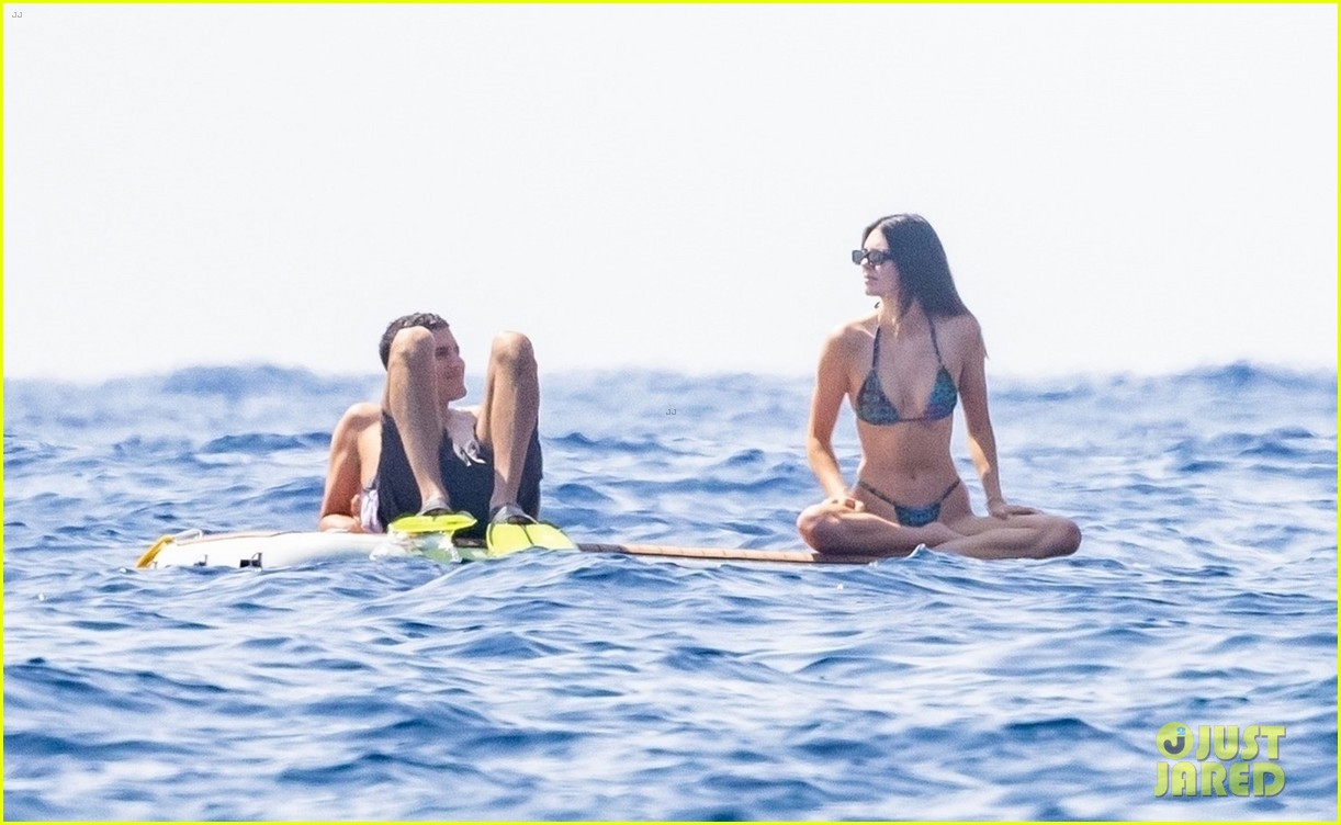 kendall jenner lounges on float in the water 424609864