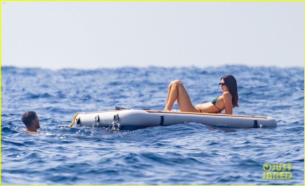 kendall jenner lounges on float in the water 584609880