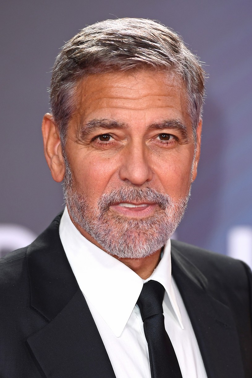 Clooney Has The Cutest Red Carpet Moment With Amal Clooney at