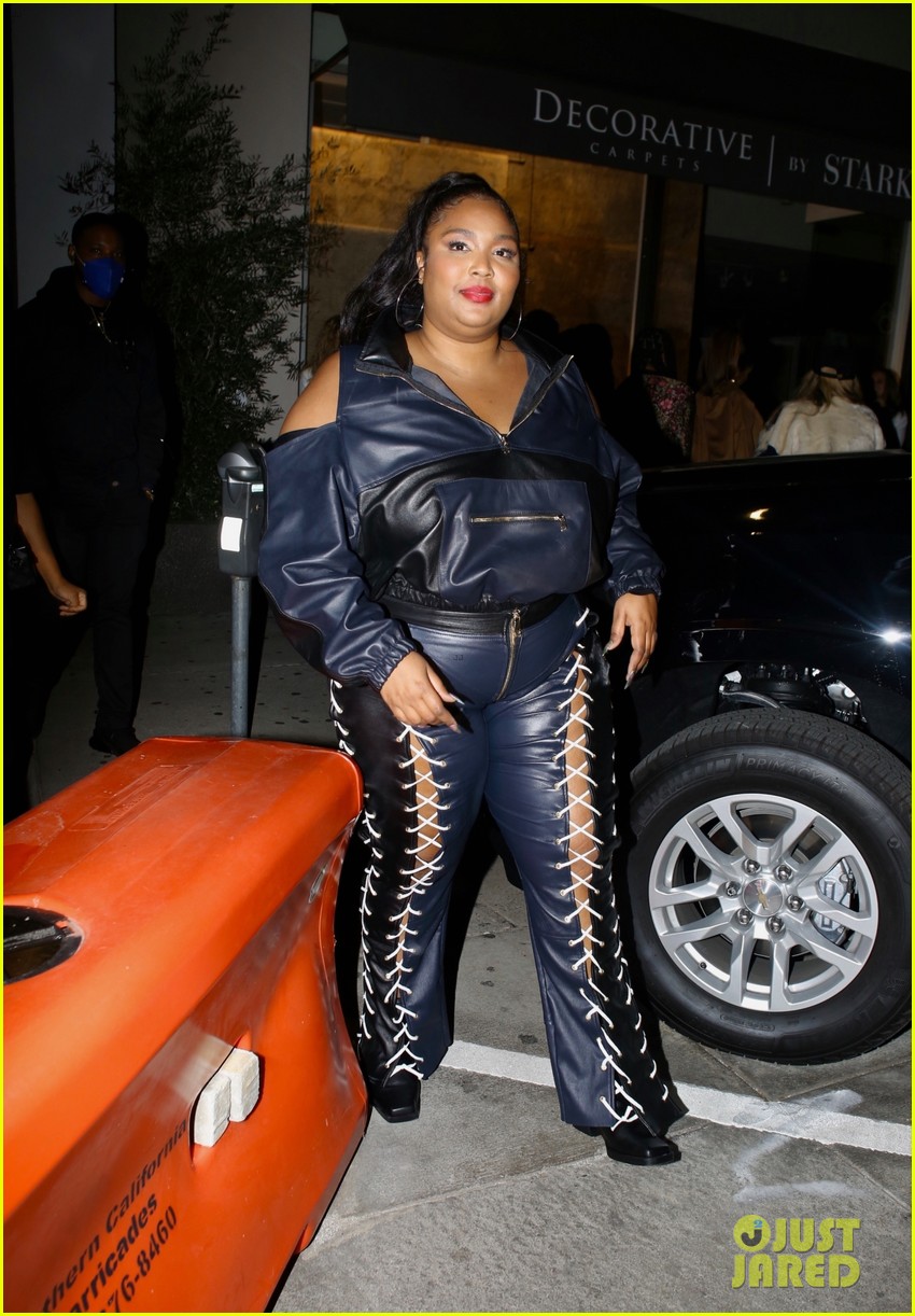 lizzo rocks laced up leather pants for night out 014651735