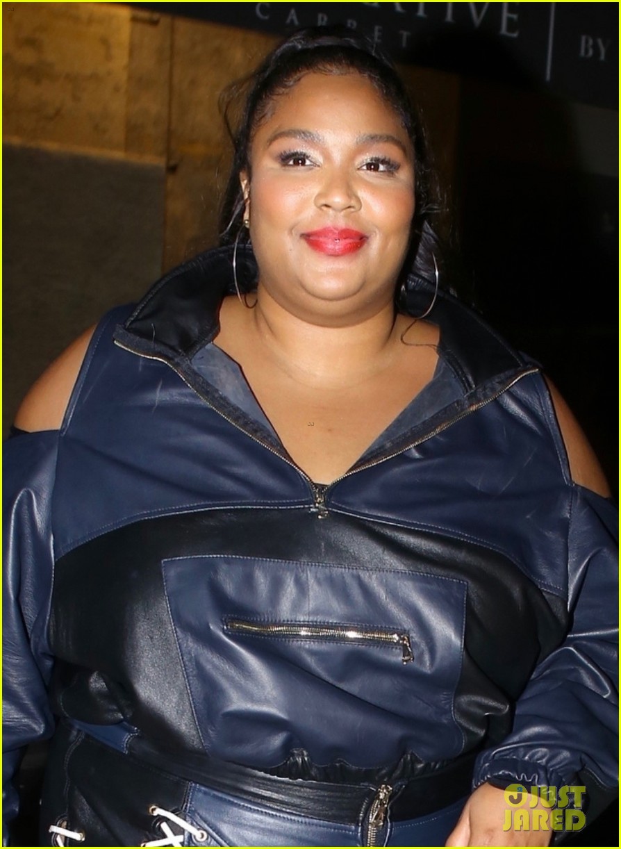 lizzo rocks laced up leather pants for night out 02