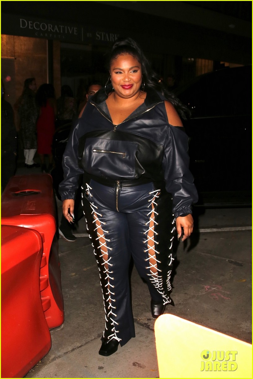 lizzo rocks laced up leather pants for night out 054651739