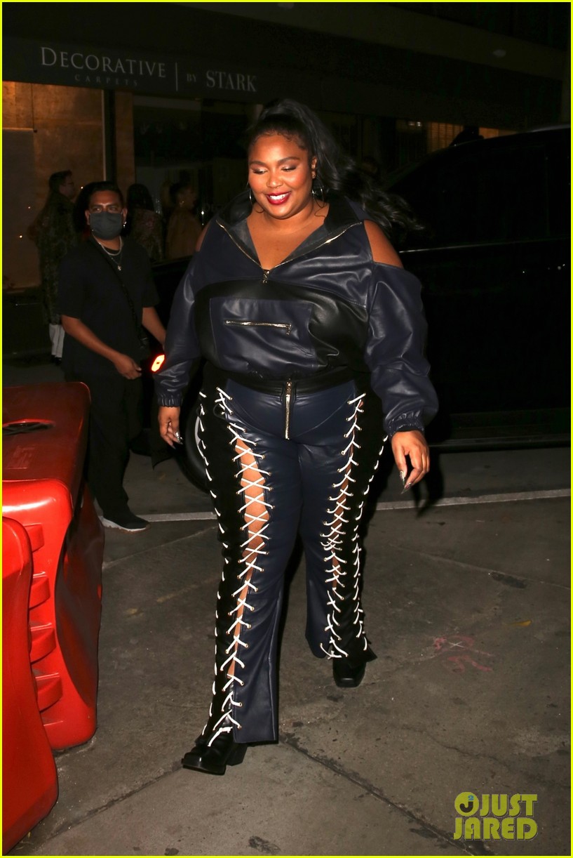 lizzo rocks laced up leather pants for night out 07