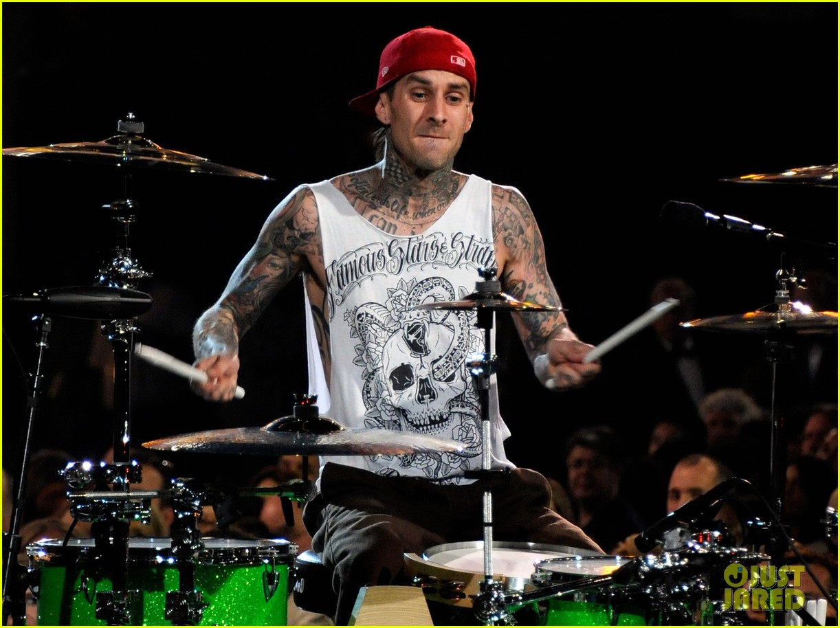 travis barker fires back at criticism of his tattoos 11