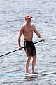 vincent cassel paddleboarding with wife tina kunakey 03
