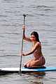 vincent cassel paddleboarding with wife tina kunakey 05